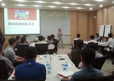 Cheryl Obal conducting a training in Korea for LG